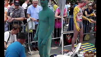 Naked Asian Lad's body is painted in public