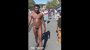 Handsome Naked Black man walks o nthe public streets