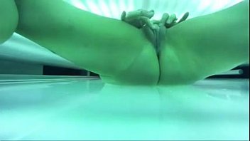 Excited Girl Squirting on Tanning Bed - thevoyeurtube.net