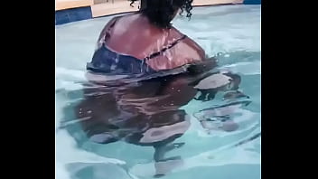 LOyal trini bounces in the pool