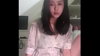 stupid Korean slut shows off tits on stream