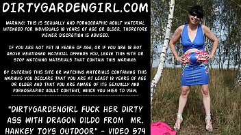 Dirtygardengirl fuck her dirty ass with Dragon dildo from  mr. Hankey Toys outdoor