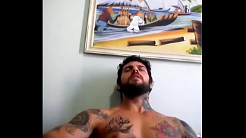 hot inked guy shows his muscles and exhib dick on webcam