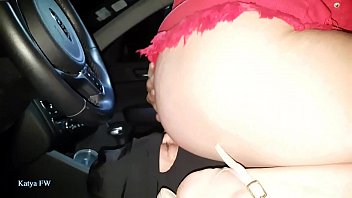 BS010619  003115 SV Katya is driving  her car wearing her red mini skirt and  using her slave as a human driver seat cushion